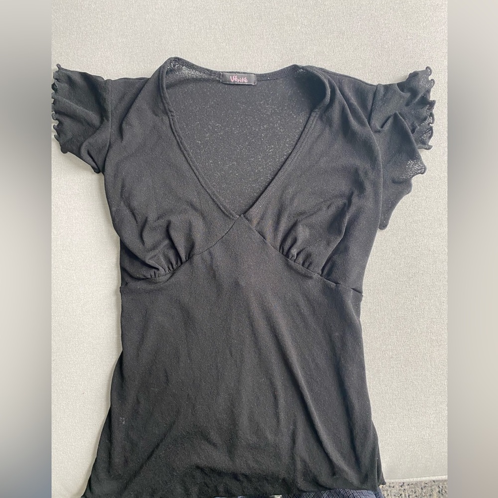 Verite Black top with its own flare. fits S-M